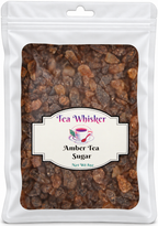 Tea Whisker Amber Tea Sugar 8 oz white pouch with softly shaded edges and visible amber-brown sugar crystals